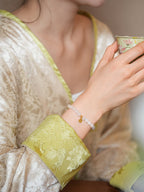 Prosperity White Marble Crystal Bracelet with Gold Coin Charm - Lunaire Jewelry