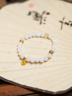 Prosperity White Marble Crystal Bracelet with Gold Coin Charm - Lunaire Jewelry